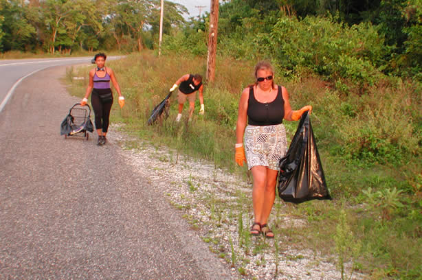 Volunteers Clean-Up Roadside Entrance to Negril - Negril Travel Guide