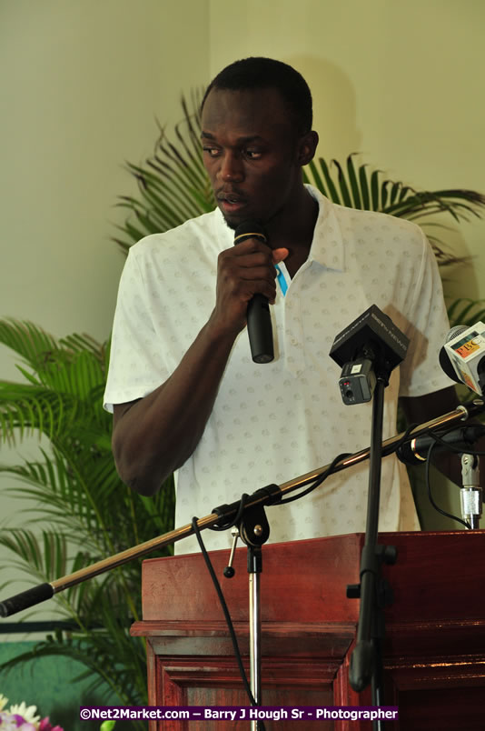 Usain Bolt of Jamaica - The Fastest Man In The World  - Usain Bolt Homecoming Celebrations - Press Conference at the Grand Bahia Principe &amp; Sherwood Content - Waldensia Primary School - Photographs by Net2Market.com - Barry J. Hough Sr. Photojournalist/Photograper - Photographs taken with a Nikon D300 - Negril Travel Guide, Negril Jamaica WI - http://www.negriltravelguide.com - info@negriltravelguide.com...!