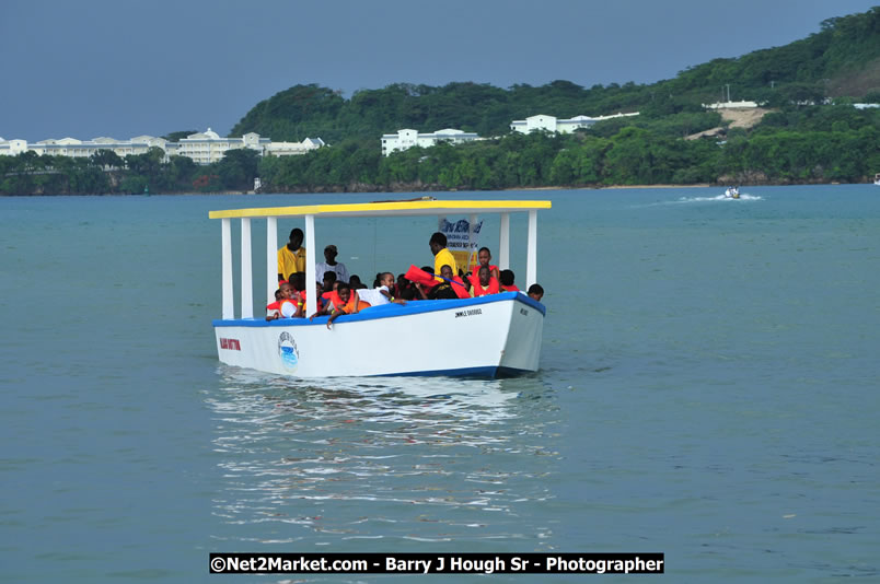 Lucea Cross the Harbour @ Lucea Car Park - All Day Event - Cross the Harbour Swim, Boat Rides, and Entertainment for the Family - Concert Featuring: Bushman, George Nooksl, Little Hero, Bushi One String, Dog Rice and many local Artists - Friday, August 1, 2008 - Lucea, Hanover Jamaica - Photographs by Net2Market.com - Barry J. Hough Sr. Photojournalist/Photograper - Photographs taken with a Nikon D300 - Negril Travel Guide, Negril Jamaica WI - http://www.negriltravelguide.com - info@negriltravelguide.com...!