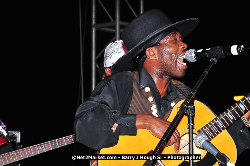 Lucea Cross the Harbour @ Lucea Car Park - All Day Event - Cross the Harbour Swim, Boat Rides, and Entertainment for the Family - Concert Featuring: Bushman, George Nooksl, Little Hero, Bushi One String, Dog Rice and many local Artists - Friday, August 1, 2008 - Lucea, Hanover Jamaica - Photographs by Net2Market.com - Barry J. Hough Sr. Photojournalist/Photograper - Photographs taken with a Nikon D300 - Negril Travel Guide, Negril Jamaica WI - http://www.negriltravelguide.com - info@negriltravelguide.com...!