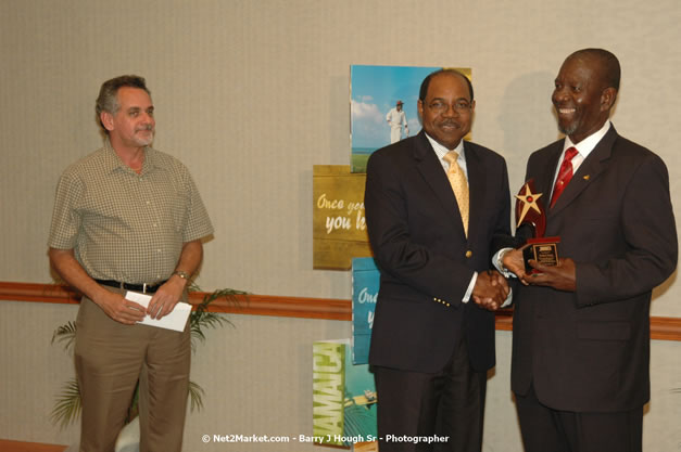 Red Cap Porters Awards - Minister of Tourism, Hon. Edmund Bartlett - Director of Tourism, Basil Smith - Friday, December 14, 2007 - Holiday Inn Sunspree, Montego Bay, Jamaica W.I. - Photographs by Net2Market.com - Barry J. Hough Sr, Photographer - Negril Travel Guide, Negril Jamaica WI - http://www.negriltravelguide.com - info@negriltravelguide.com...!