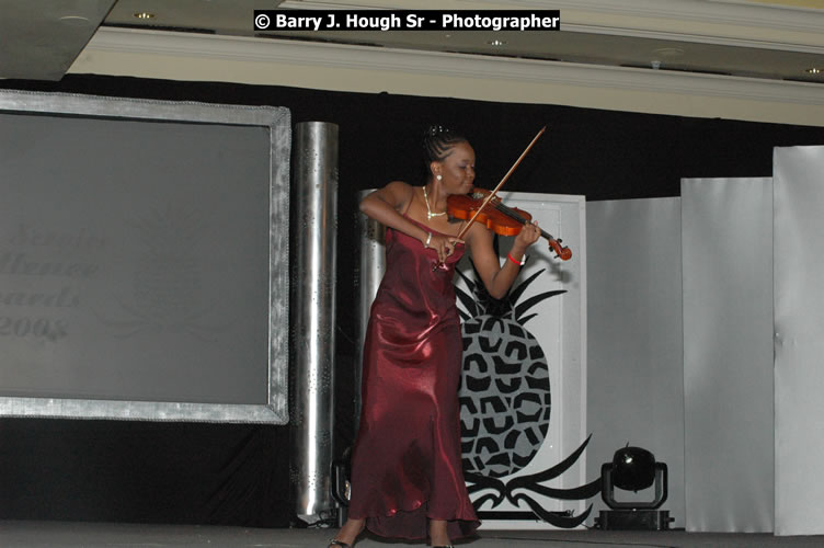 The Ministry of Tourism - Tourism Service Excellence Awards Ceremony held at the Ritz Carlton Rose Rall Golf and Spa Resort, Montego Bay on Friday, April 24, 2009 - Photographs by Net2Market.com - Barry J. Hough Sr. Photojournalist/Photograper - Photographs taken with a Nikon D300 - Negril Travel Guide, Negril Jamaica WI - http://www.negriltravelguide.com - info@negriltravelguide.com...!