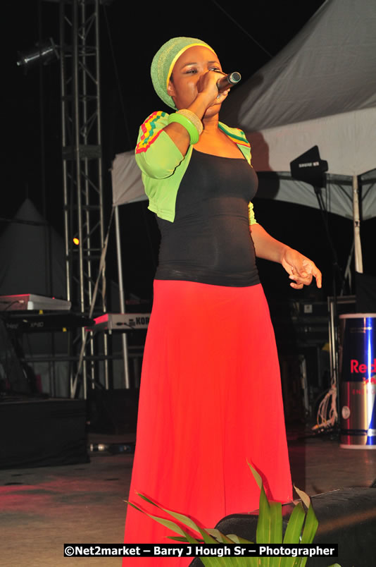 Queen Ifrica @ Unite The People An International Reggae Fest, Featuring: Beres Hammond, Coco T, Queen Ifrica, Khalil, Cameal Davis, Iley Dread, Rochelle, Geoffrey Star, Ras Penco, Kool DeLoy, Otis Gayle, J.McKay, Tiney Winey, Venue at Norman Manley Boulevard, Negril, Westmoreland, Jamaica - Saturday, April 4, 2009 - Photographs by Net2Market.com - Barry J. Hough Sr, Photographer/Photojournalist - Negril Travel Guide, Negril Jamaica WI - http://www.negriltravelguide.com - info@negriltravelguide.com...!