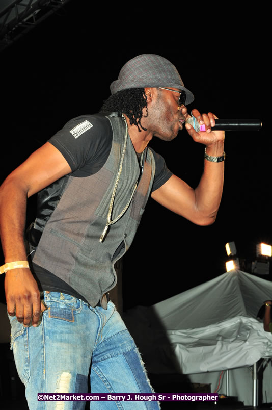 Usain Bolt of Jamaica - The Fastest Man In The World  - Usain Bolt Homecoming Celebrations Concert at the William Knibb High School Play Field, Trelawny - Ice, Ding Dong, Ravers Clavers, D'Angel, Voicemail, RDX and Dancers, Wayne Marshall, Tammi Chynn, Bugle, Nero, Tanya Stephens, Richie Spice, Kip Rich,and Shaggy - Photographs by Net2Market.com - Barry J. Hough Sr. Photojournalist/Photograper - Photographs taken with a Nikon D300 - Negril Travel Guide, Negril Jamaica WI - http://www.negriltravelguide.com - info@negriltravelguide.com...!